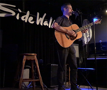 Ethan Cord at the Sidewalk Cafe. Click for full size